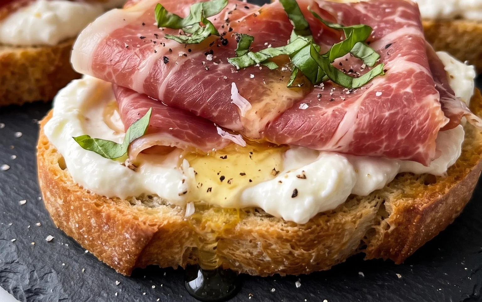 Beef Prosciutto Crostini with Burrata and Lemon Honey Drizzle